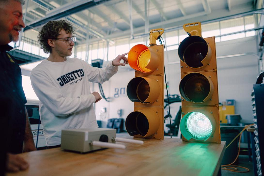 Kettering Student examining stoplight at the MRC